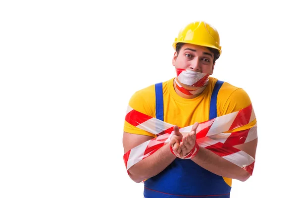 Funny worker wearing coveralls with tape — Stock Photo, Image