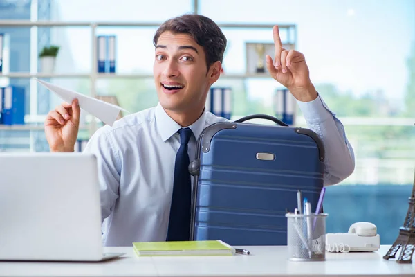 Businessman thinking of vacation travel — Stock Photo, Image