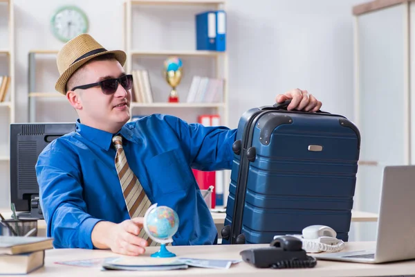 Young employee preparing for vacation trip