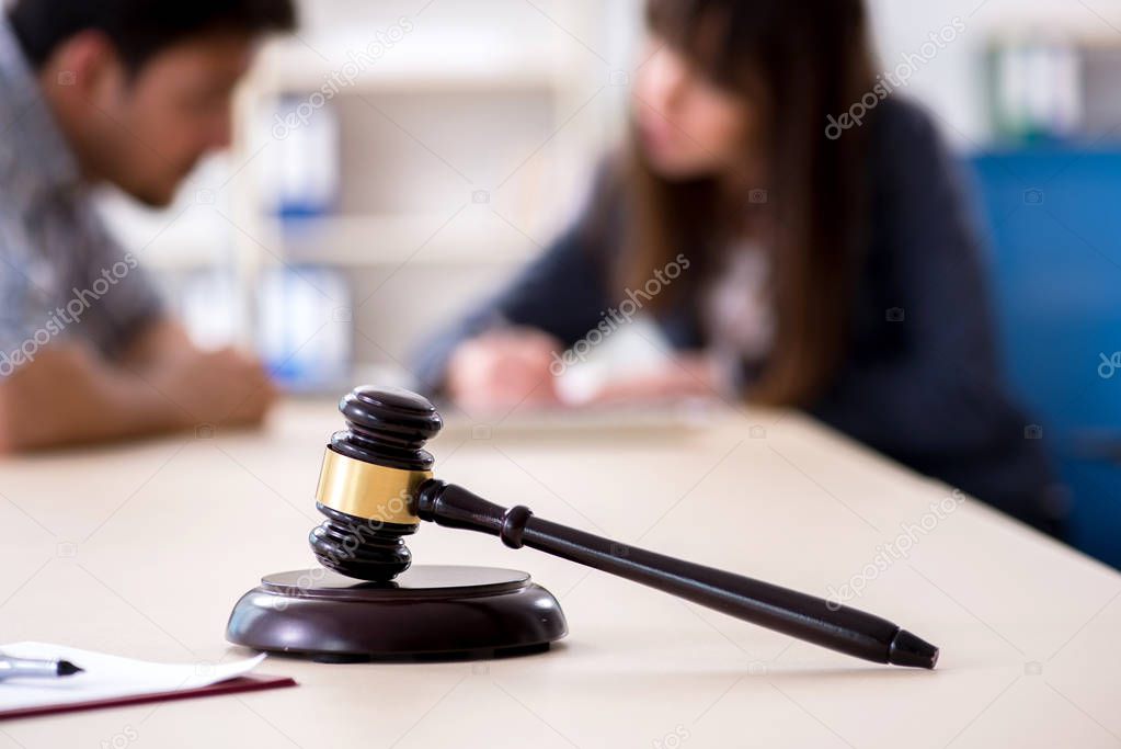 Female lawyer meeting with his male client in the office