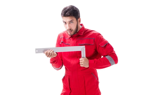 Jonge reparateur met een vierkante liniaal geïsoleerd op witte achtergrond — Stockfoto