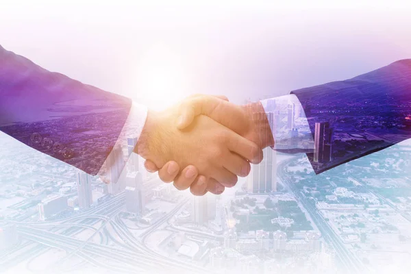 Concept of cooperation with handshake — Stock Photo, Image