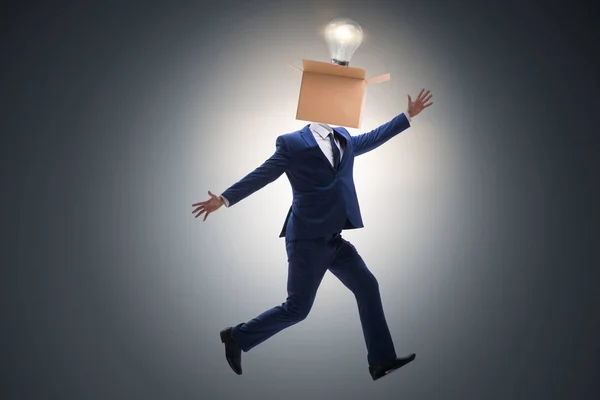 Businessman in thinking out of box concept — Stock Photo, Image