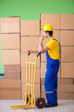 Man contractor working with boxes delivery clipart