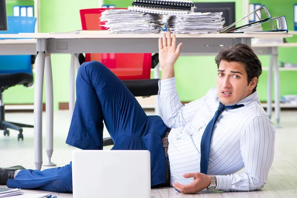 Frustrated businessman stressed from excessive work