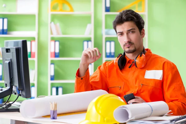 Construction supervisor planning new project in office — Stock Photo, Image