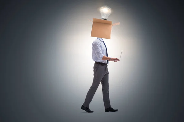 Businessman in thinking out of box concept — Stock Photo, Image