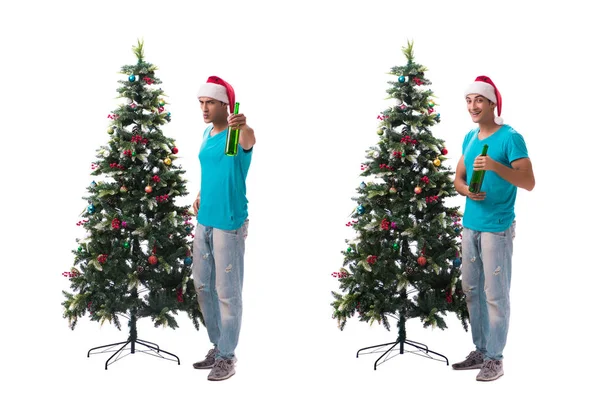 Hombre joven decorando árbol de Navidad aislado en blanco —  Fotos de Stock