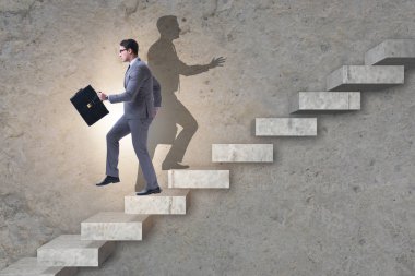 İş adamı ve iş konseptindeki gölgesi