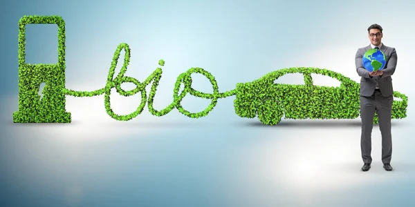 Affärsman med bil som drivs med biobränsle — Stockfoto