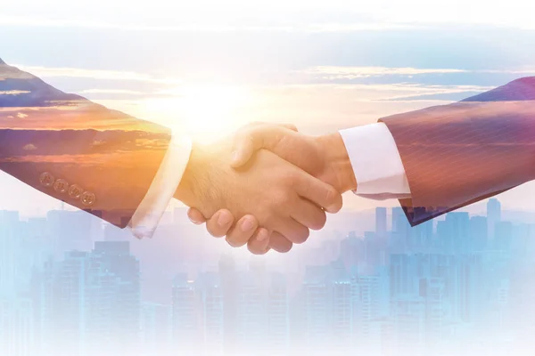 Concept of cooperation with handshake — Stock Photo, Image