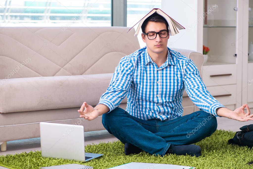Student meditating and preparing for university exams