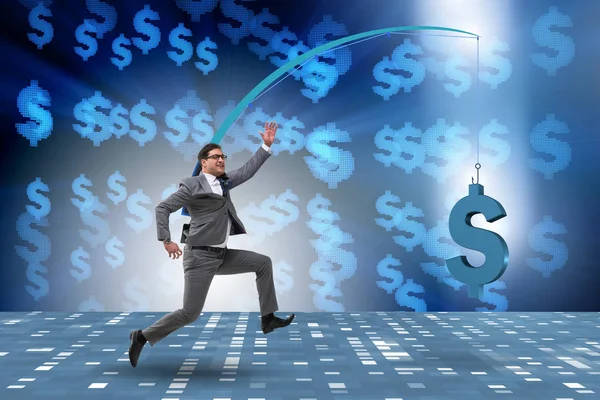 Businessman chasing money on fishing rod — Stock Photo, Image