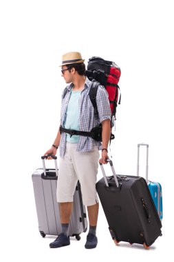 Genç bir aile beyazlar içinde tatile çıkmaya hazırlanıyor.