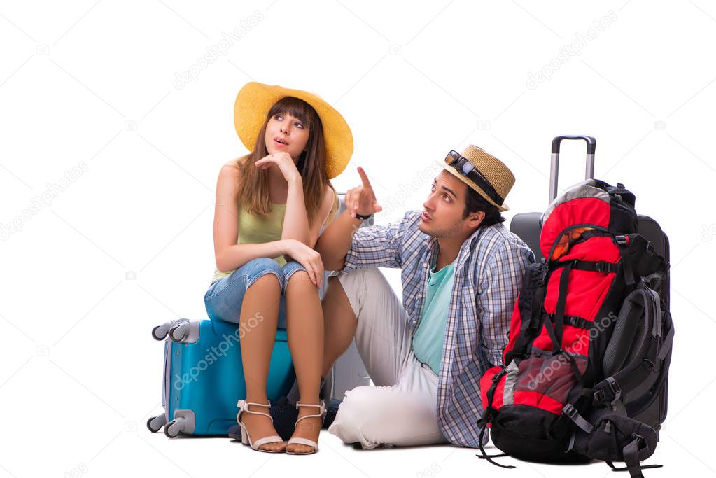 Young family preparing for vacation travel on white