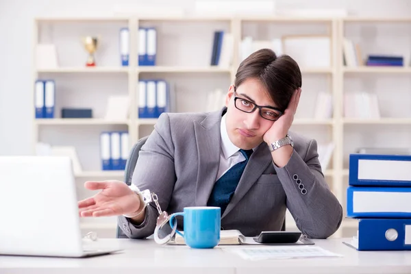 Businessman chained with handcuffs to his coffee — Stock Photo, Image