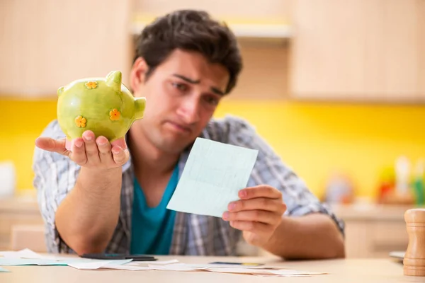 Young man husband in budget planning concept — Stock Photo, Image