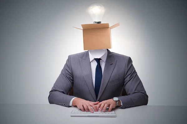 Businessman in thinking out of box concept — Stock Photo, Image
