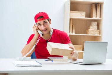 Call center worker at parcel distribution center in post office clipart