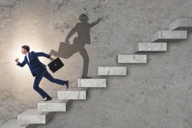 İş adamı ve iş konseptindeki gölgesi