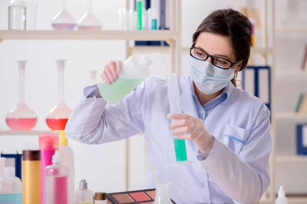 Lab chemist checking beauty and make-up products