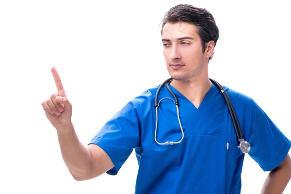 Jonge mannelijke arts druk op knoppen geïsoleerd op wit — Stockfoto