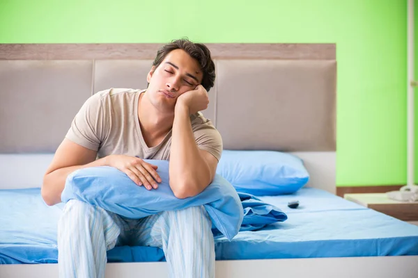 Man suffering from sleeping disorder and insomnia — Stock Photo, Image