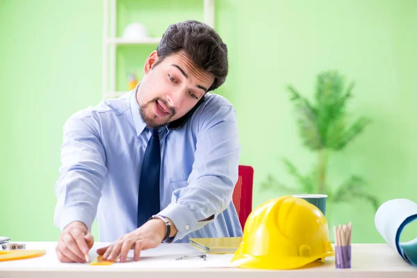 Young male architect working at the project — Stock Photo, Image