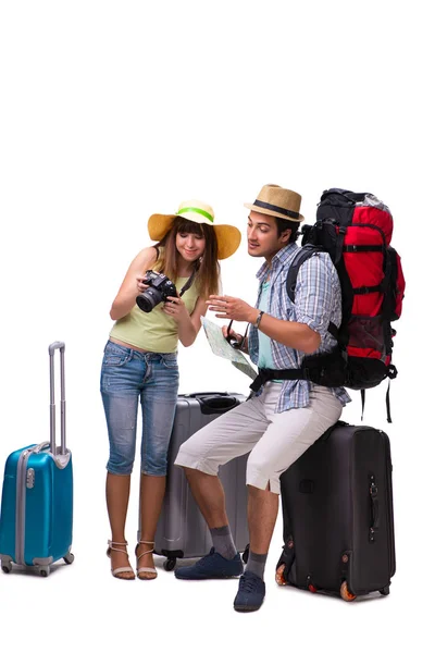 Νεαρή οικογένεια ετοιμάζεται για ταξίδια διακοπών σε λευκό — Φωτογραφία Αρχείου