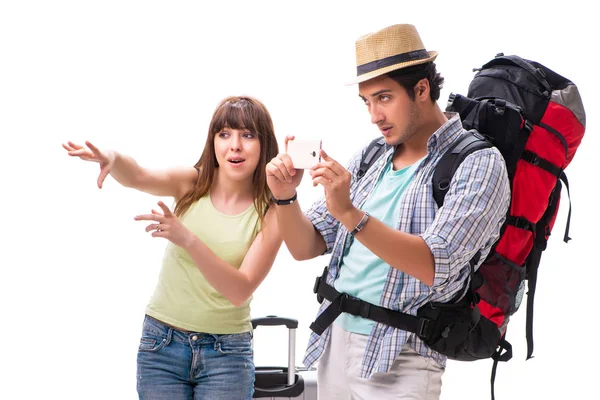 Young family preparing for vacation travel on white — Stock Photo, Image