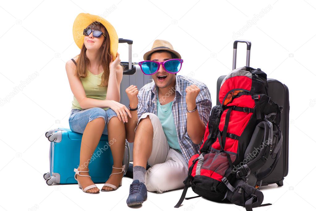 Young family preparing for vacation travel on white