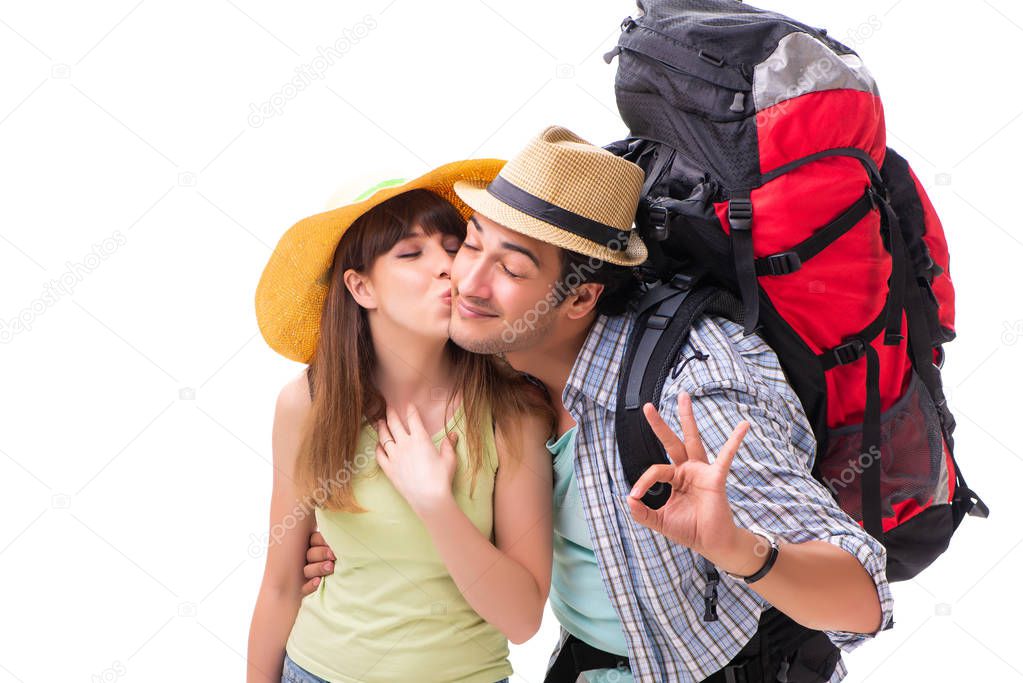 Young family preparing for vacation travel on white