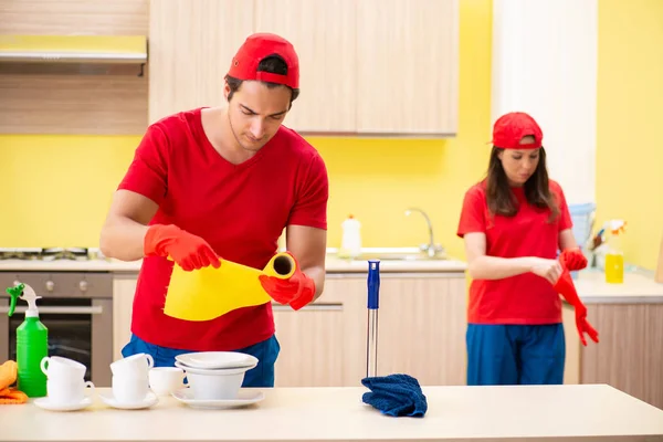 Cleaning professional contractors working at kitchen — Stock Photo, Image