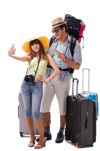 Familia joven preparándose para viajar de vacaciones en blanco —  Fotos de Stock