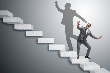 İş adamı ve iş konseptindeki gölgesi