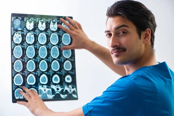 Young handsome doctor radiologyst working in hospital — Stock Photo, Image