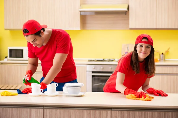 Cleaning professional contractors working at kitchen — Stock Photo, Image