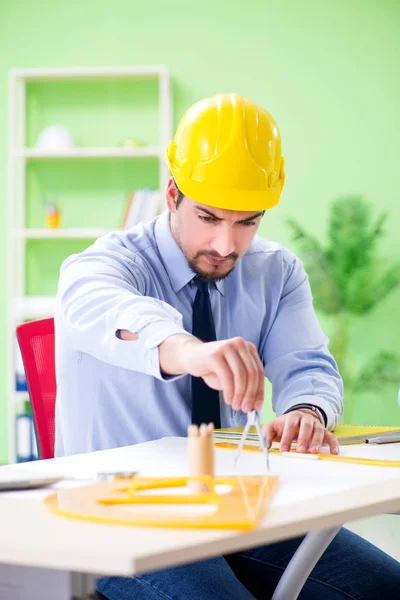 Young male architect working at the project — Stock Photo, Image