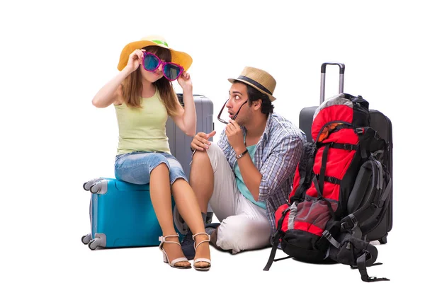 Família jovem se preparando para viagens de férias em branco — Fotografia de Stock