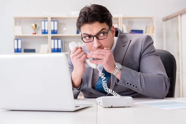 Businessman leaking confidential information over phone — Stock Photo, Image