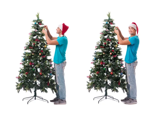 Hombre joven decorando árbol de Navidad aislado en blanco —  Fotos de Stock