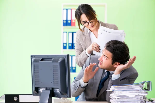 Man employee suffering from excessive work — Stock Photo, Image
