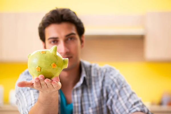 Young man husband in budget planning concept — Stock Photo, Image