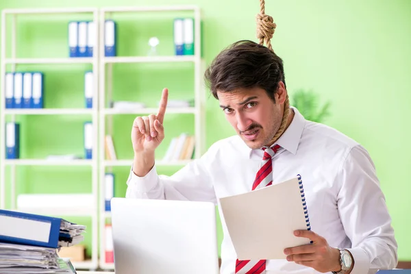 Despaired businessman thinking of suicide in the office — Stock Photo, Image