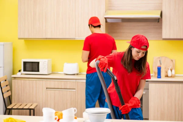 Cleaning professional contractors working at kitchen — Stock Photo, Image