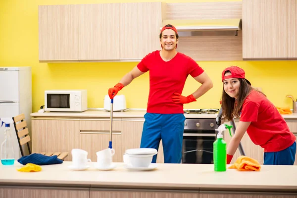 Cleaning professional contractors working at kitchen — Stock Photo, Image