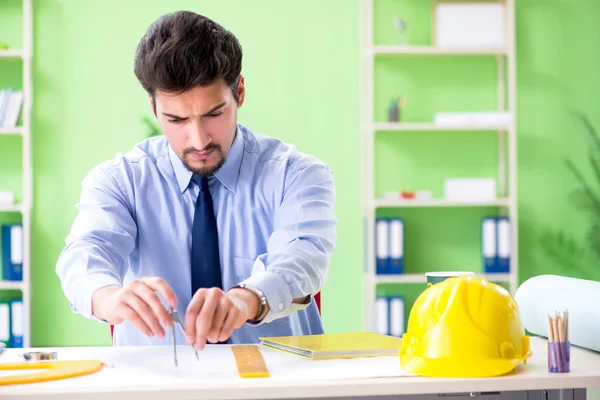 Young male architect working at the project — Stock Photo, Image