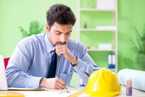 Young male architect working at the project — Stock Photo, Image