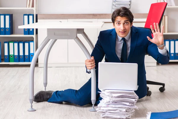 Tired exhausted businessman working overtime in office — Stock Photo, Image