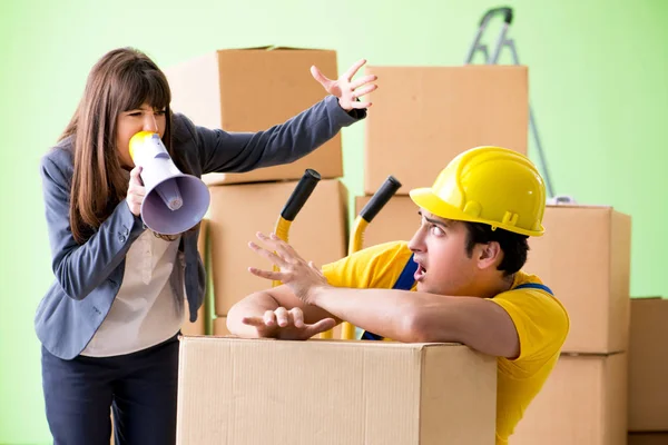 stock image Woman boss and man contractor working with boxes delivery